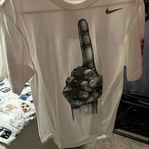Nike Cream T-Shirt with Hand Graphic and Gold Logo